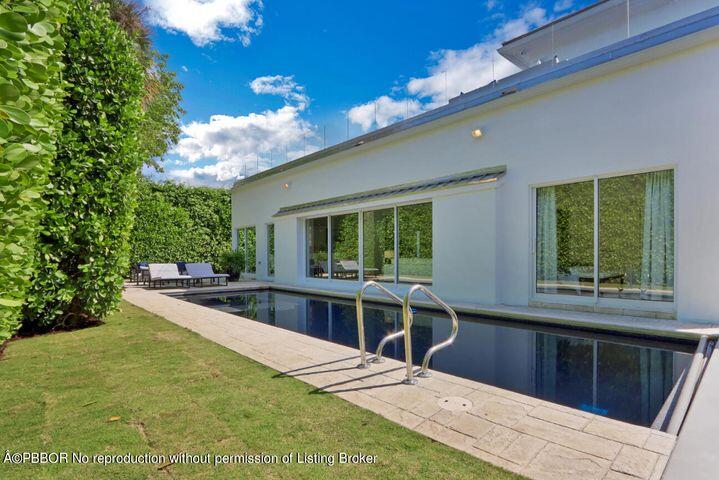 215 Indian Road Palm Beach, FL 33480 - Photo 31 of 32 a view of a kitchen with kitchen island and a large window