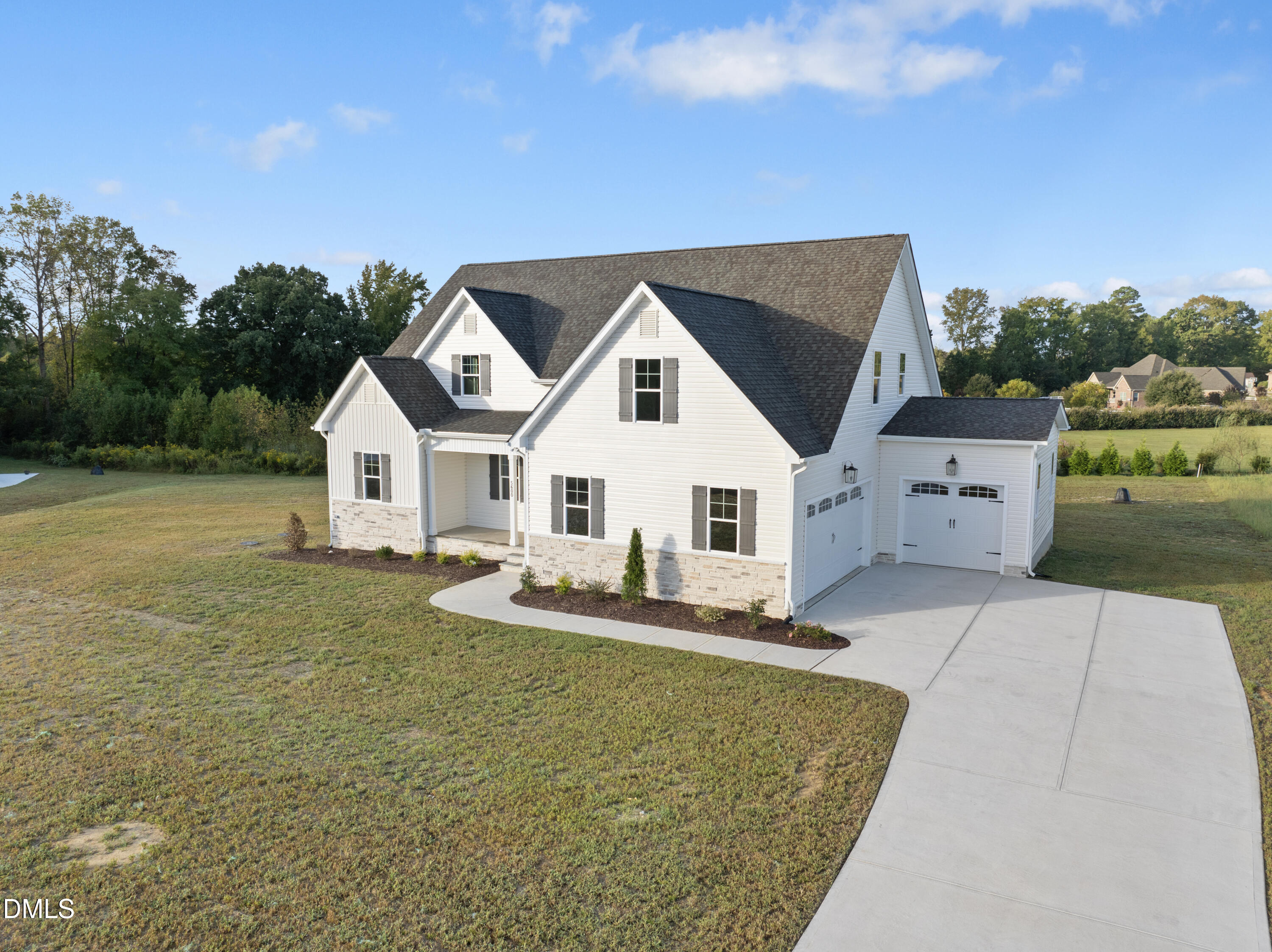 5600 River Buck Rd Spring Spring Hope, NC 27882 - Photo 2 of 31 a view of a house with a yard