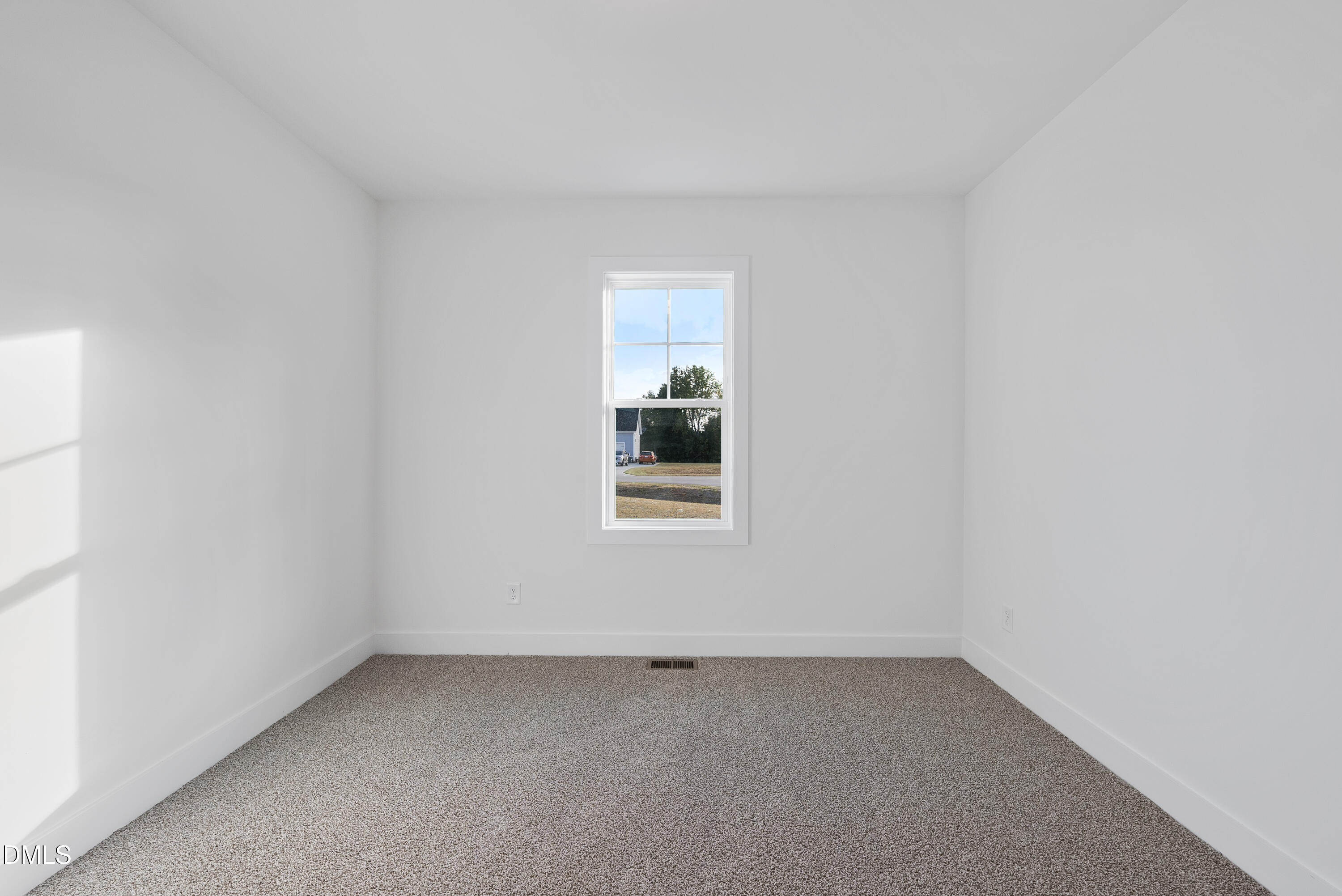 5600 River Buck Rd Spring Spring Hope, NC 27882 - Photo 24 of 31 an empty room with a window