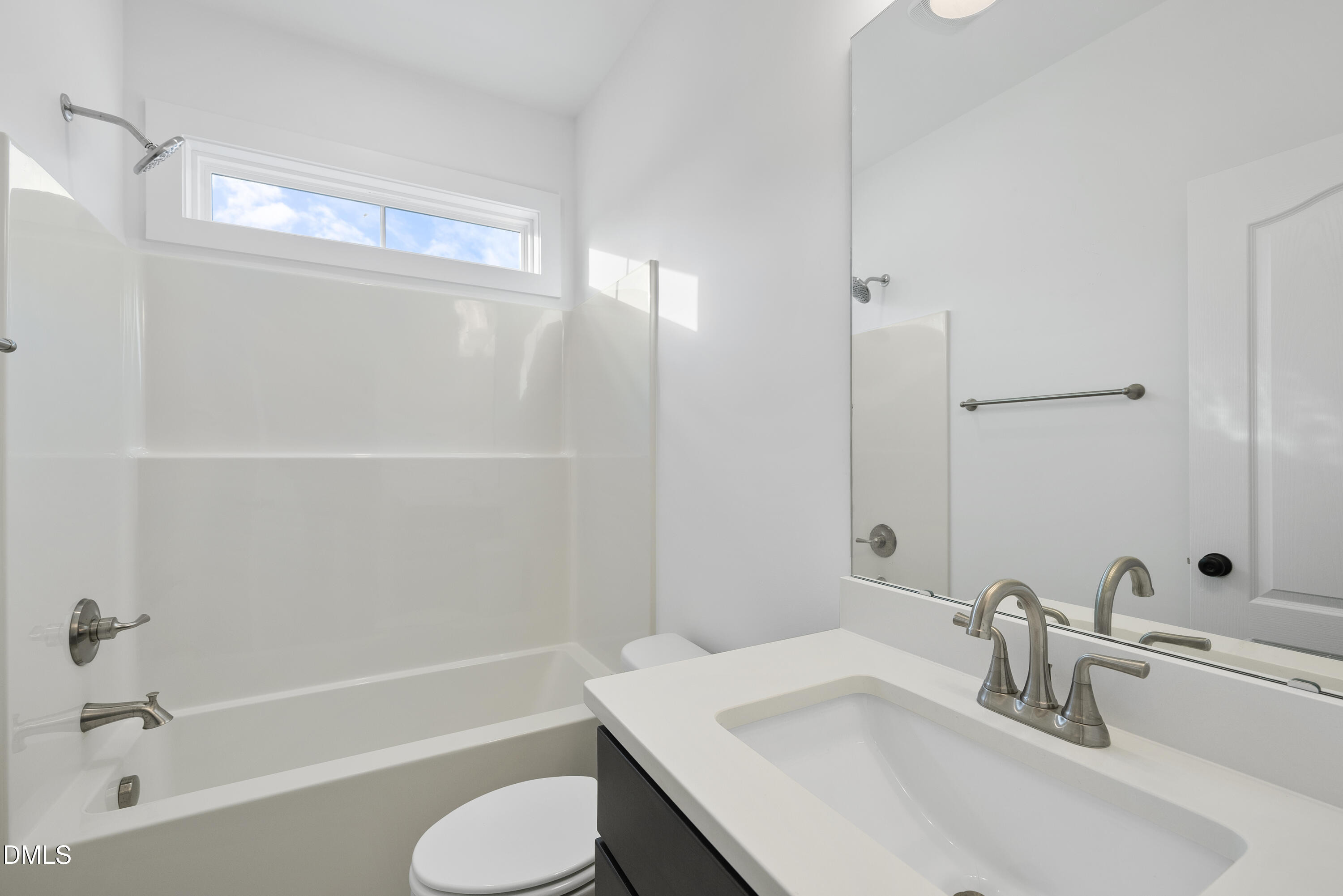 5600 River Buck Rd Spring Spring Hope, NC 27882 - Photo 25 of 31 a bathroom with a sink toilet and shower