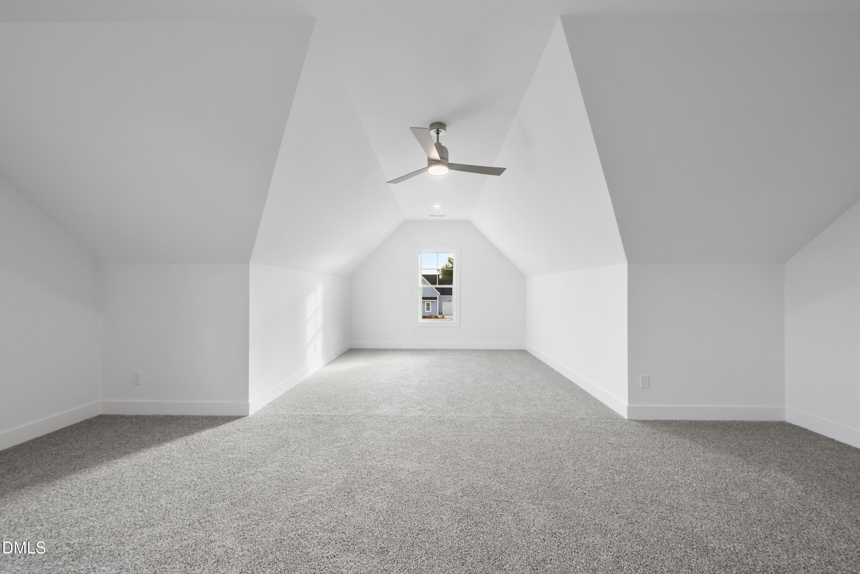 5600 River Buck Rd Spring Spring Hope, NC 27882 - Photo 26 of 31 an empty room with a ceiling fan and a window