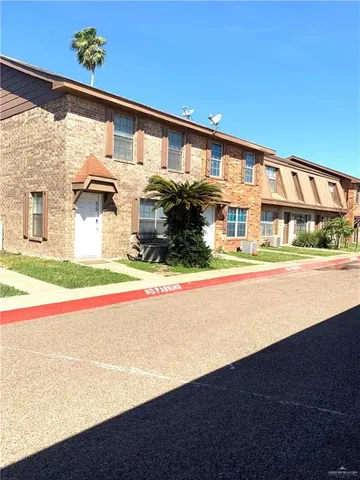 a front view of building with an outdoor space