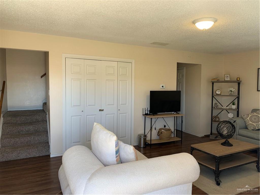 2201 South Jackson Road, Unit 35 Pharr, TX 78577 - Photo 3 of 21 a living room with furniture and a flat screen tv