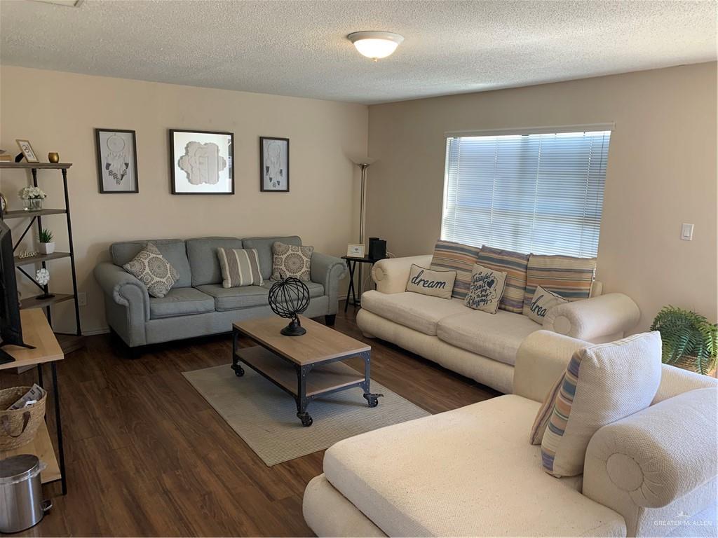 2201 South Jackson Road, Unit 35 Pharr, TX 78577 - Photo 4 of 21 a living room with furniture and a large window