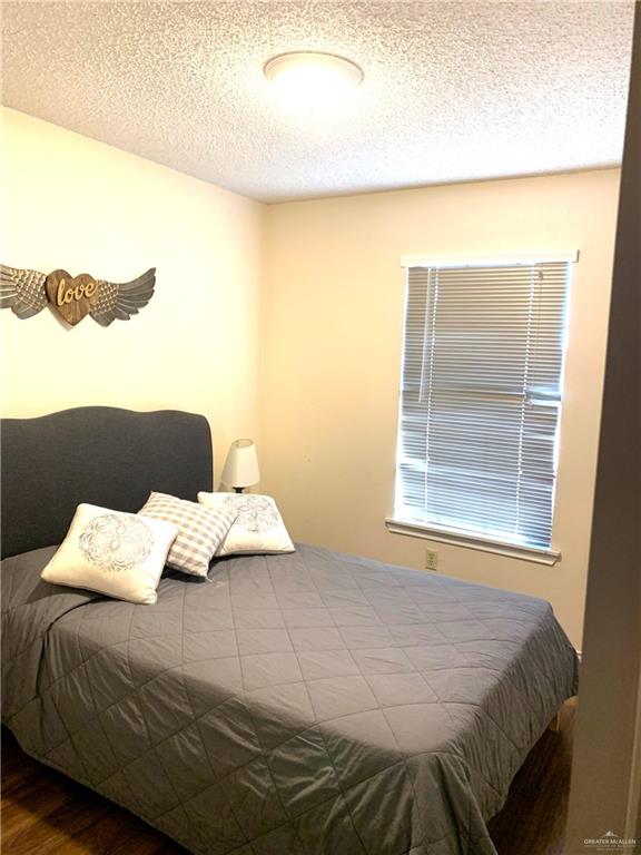 2201 South Jackson Road, Unit 35 Pharr, TX 78577 - Photo 10 of 21 a bedroom with a bed and a window