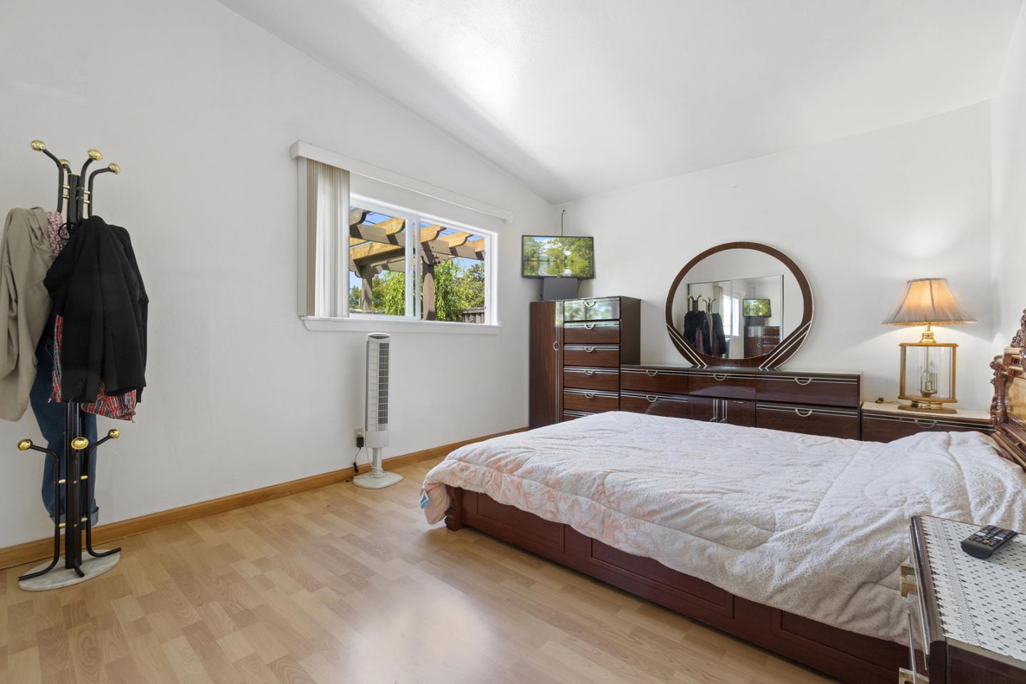 1958 Jackson Street Santa Clara, CA 95050 - Photo 17 of 22 a bedroom with a bed a mirror and desk