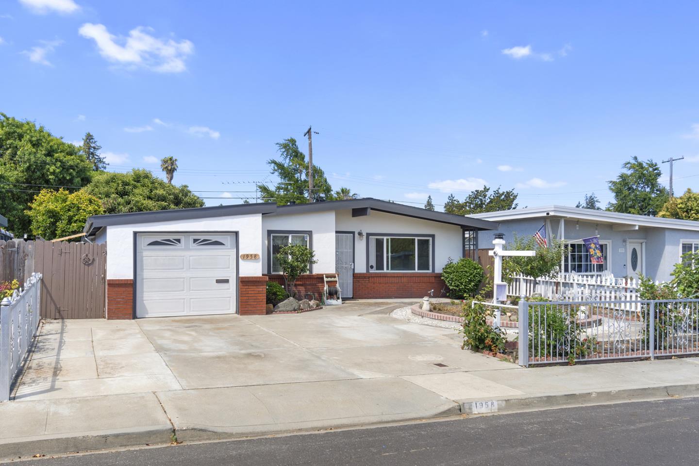 1958 Jackson Street Santa Clara, CA 95050 - Photo 2 of 22 a front view of house with yard