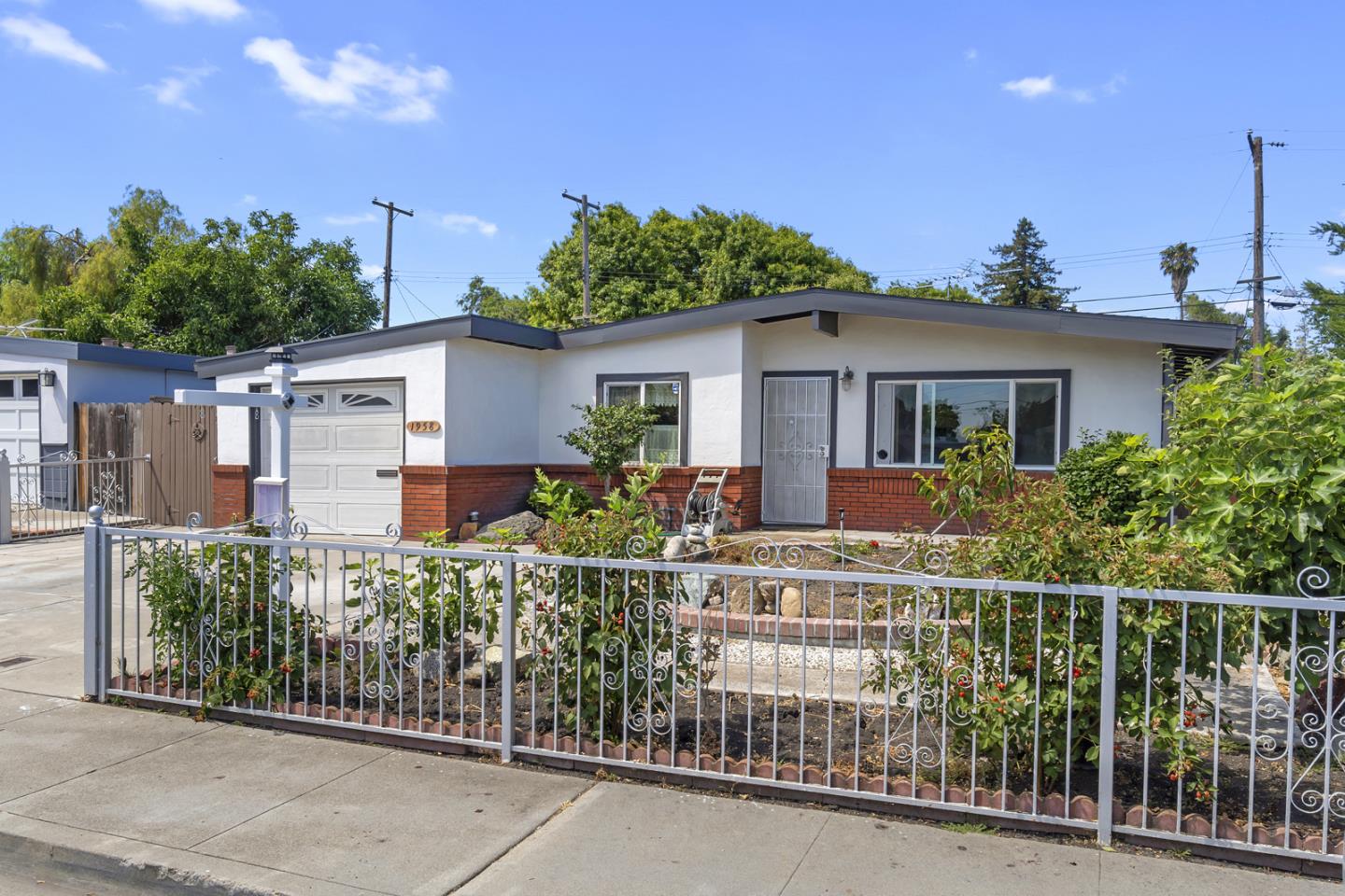 1958 Jackson Street Santa Clara, CA 95050 - Photo 3 of 22 front view of a house with a small yard