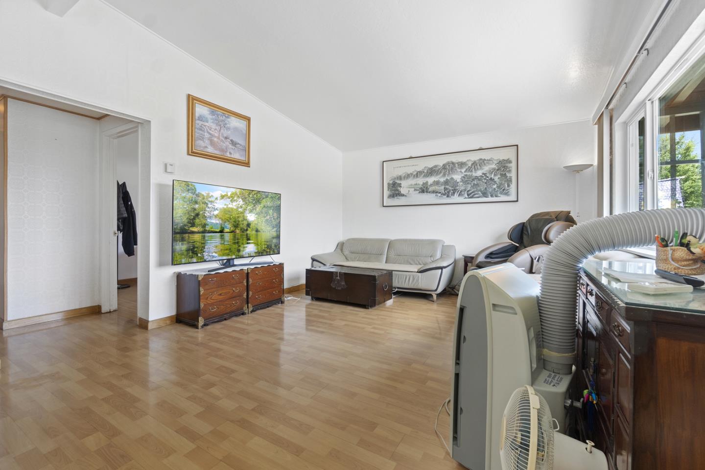 1958 Jackson Street Santa Clara, CA 95050 - Photo 5 of 22 a living room with furniture and a flat screen tv