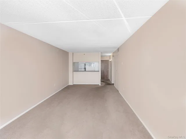 a kitchen with a sink dishwasher and cabinets