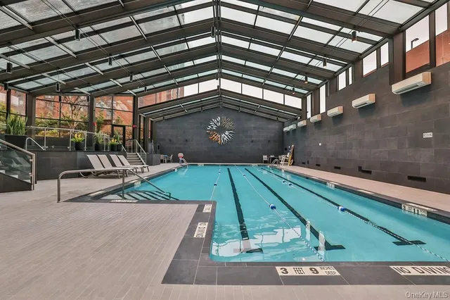 a view of a patio with a table and chairs