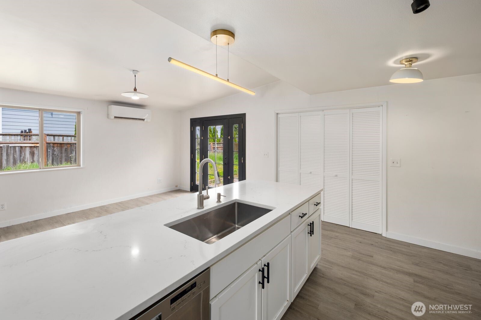101 161st Street Southeast Bothell, WA 98012 - Photo 13 of 34 a kitchen with a sink cabinets and wooden floor