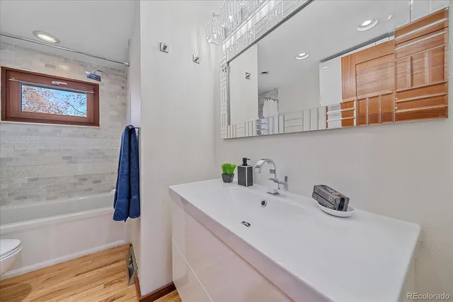 a bathroom with a sink and a bathtub