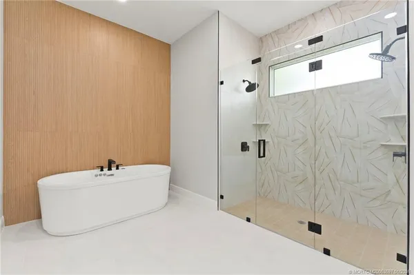 a bathroom with a white bath tub