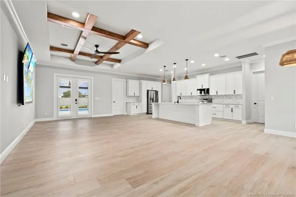 a view of a kitchen with a sink and a stove