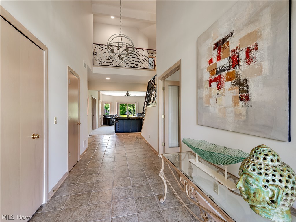 6137 Isley Road Northwest Canton, OH 44718 - Photo 2 of 35 Gorgeous tile foyer with two story balcony overlook.