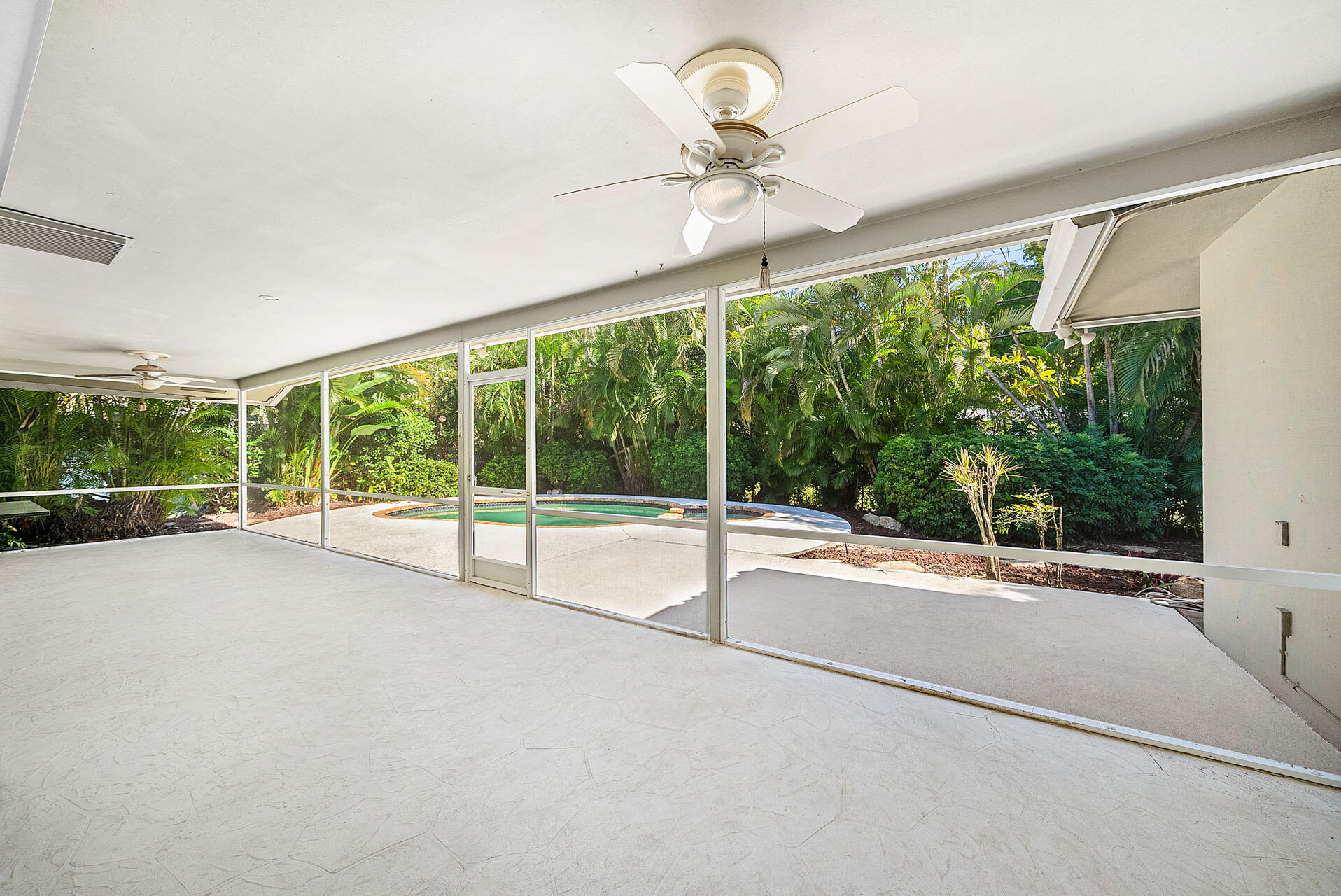 220 Southwest 9th Avenue Boca Raton, FL 33486 - Photo 19 of 42 a view of an empty room with a balcony