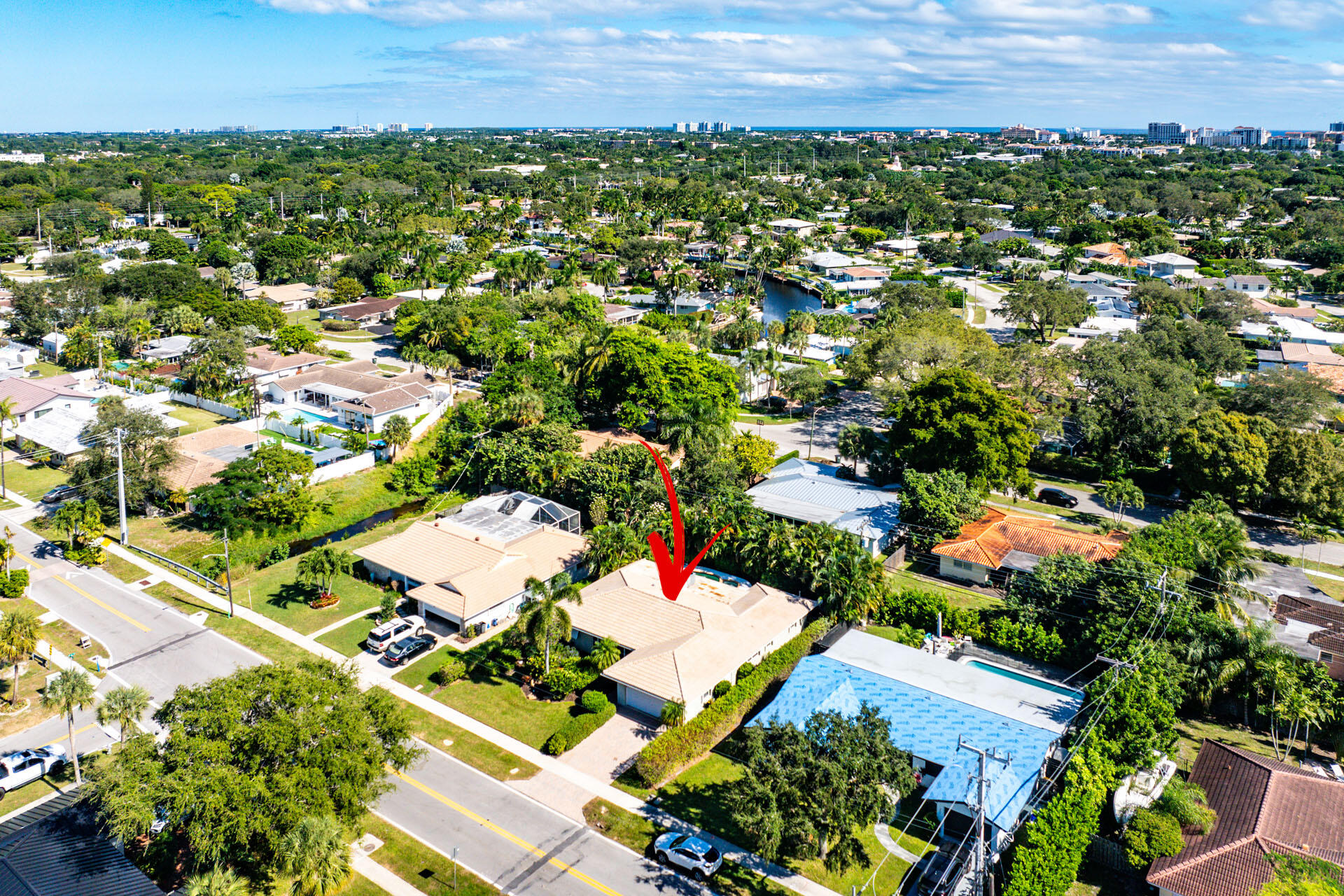 220 Southwest 9th Avenue Boca Raton, FL 33486 - Photo 2 of 42 an aerial view of residential houses with city view