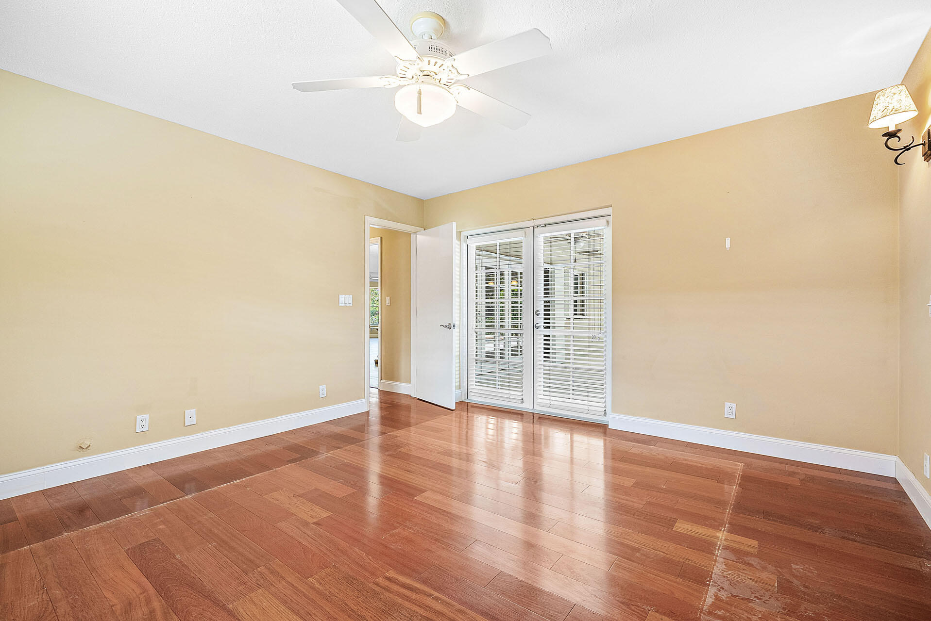 220 Southwest 9th Avenue Boca Raton, FL 33486 - Photo 26 of 42 wooden floor in an empty room with a window