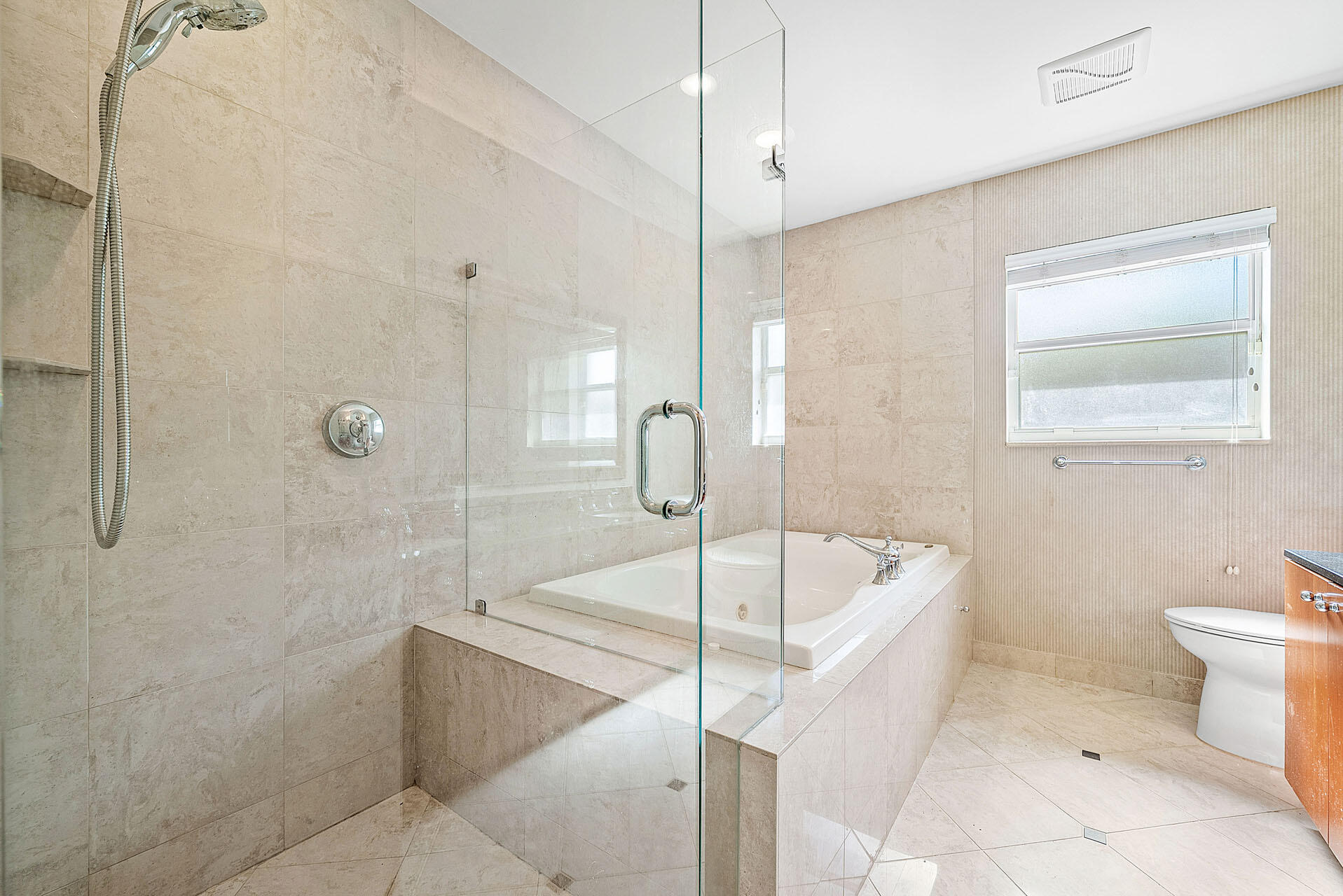 220 Southwest 9th Avenue Boca Raton, FL 33486 - Photo 27 of 42 a bathroom with a sink a toilet and bathtub