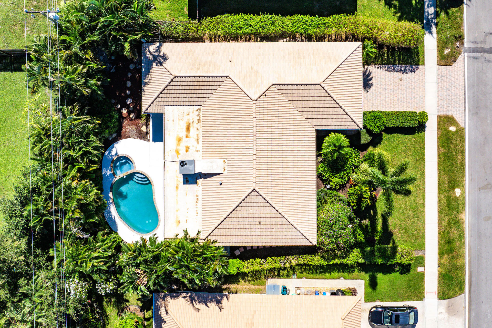 220 Southwest 9th Avenue Boca Raton, FL 33486 - Photo 37 of 42 an aerial view of a house with a yard and potted plants