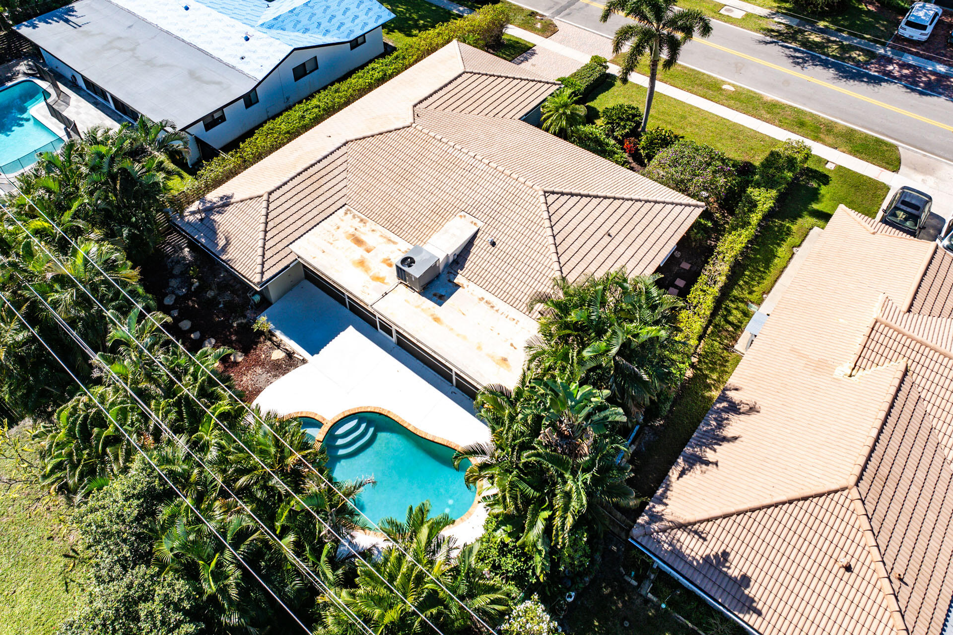 220 Southwest 9th Avenue Boca Raton, FL 33486 - Photo 38 of 42 a view of a house with a flower garden