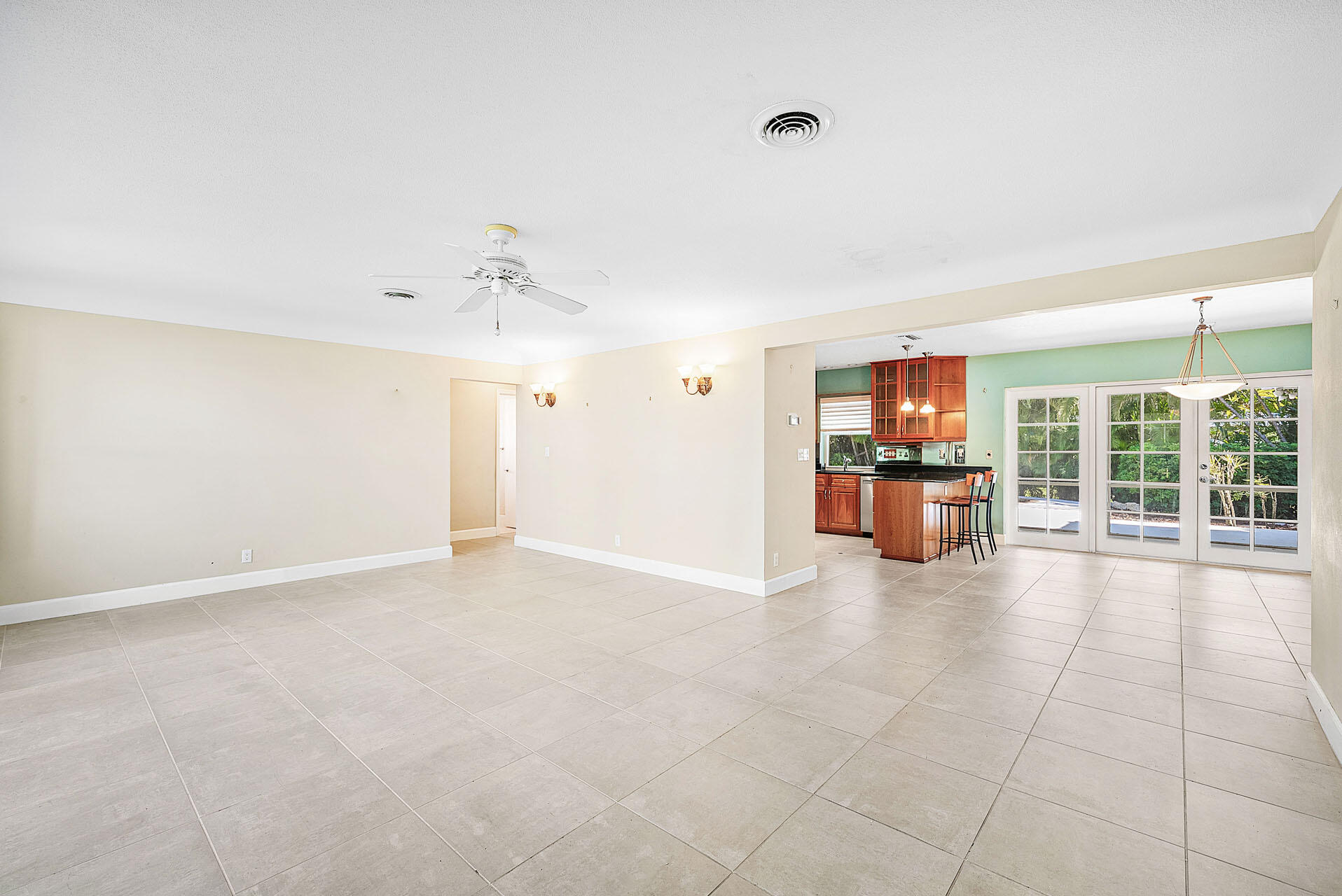 220 Southwest 9th Avenue Boca Raton, FL 33486 - Photo 7 of 42 a view of an empty room with a window