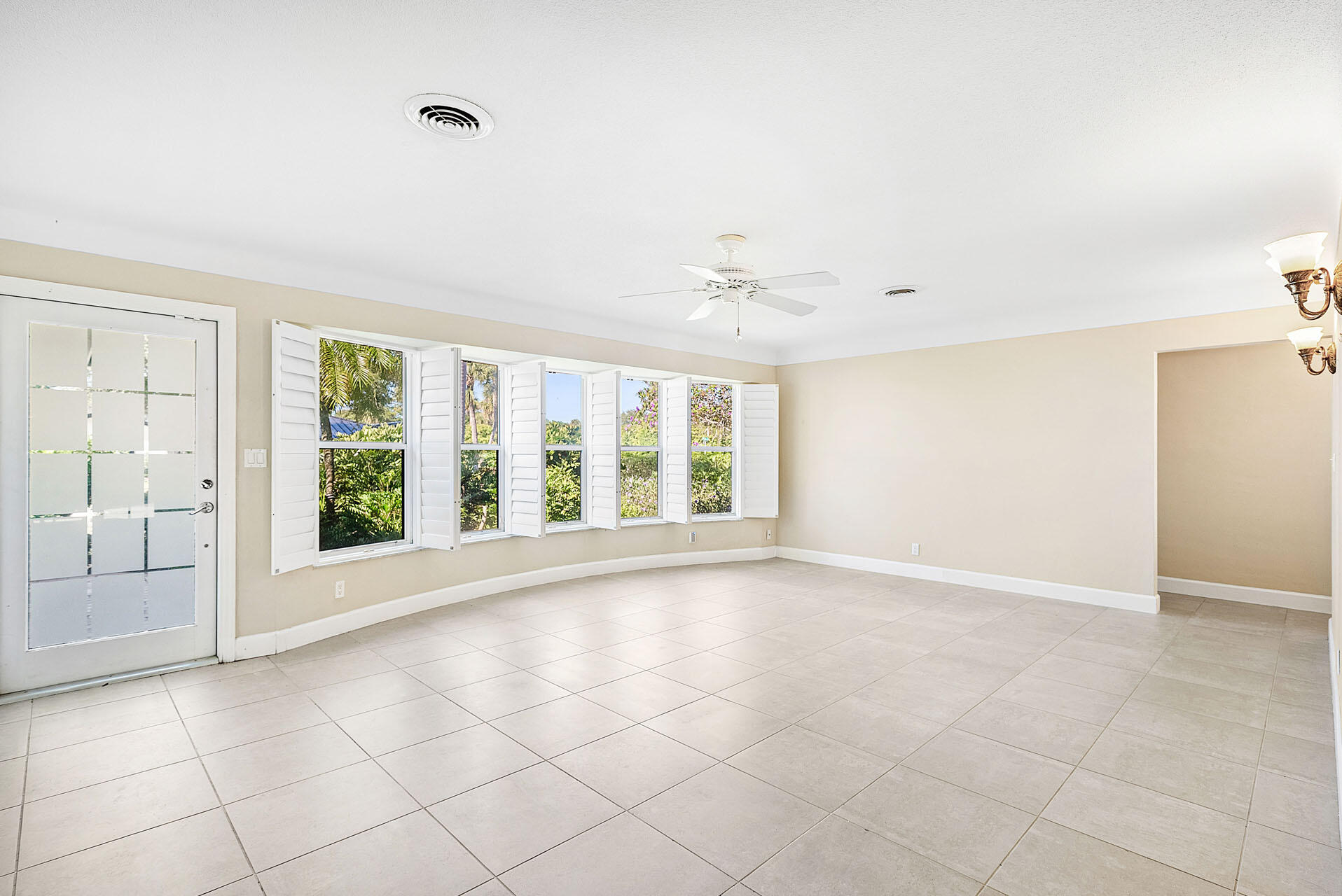 220 Southwest 9th Avenue Boca Raton, FL 33486 - Photo 8 of 42 a view of an empty room with a window