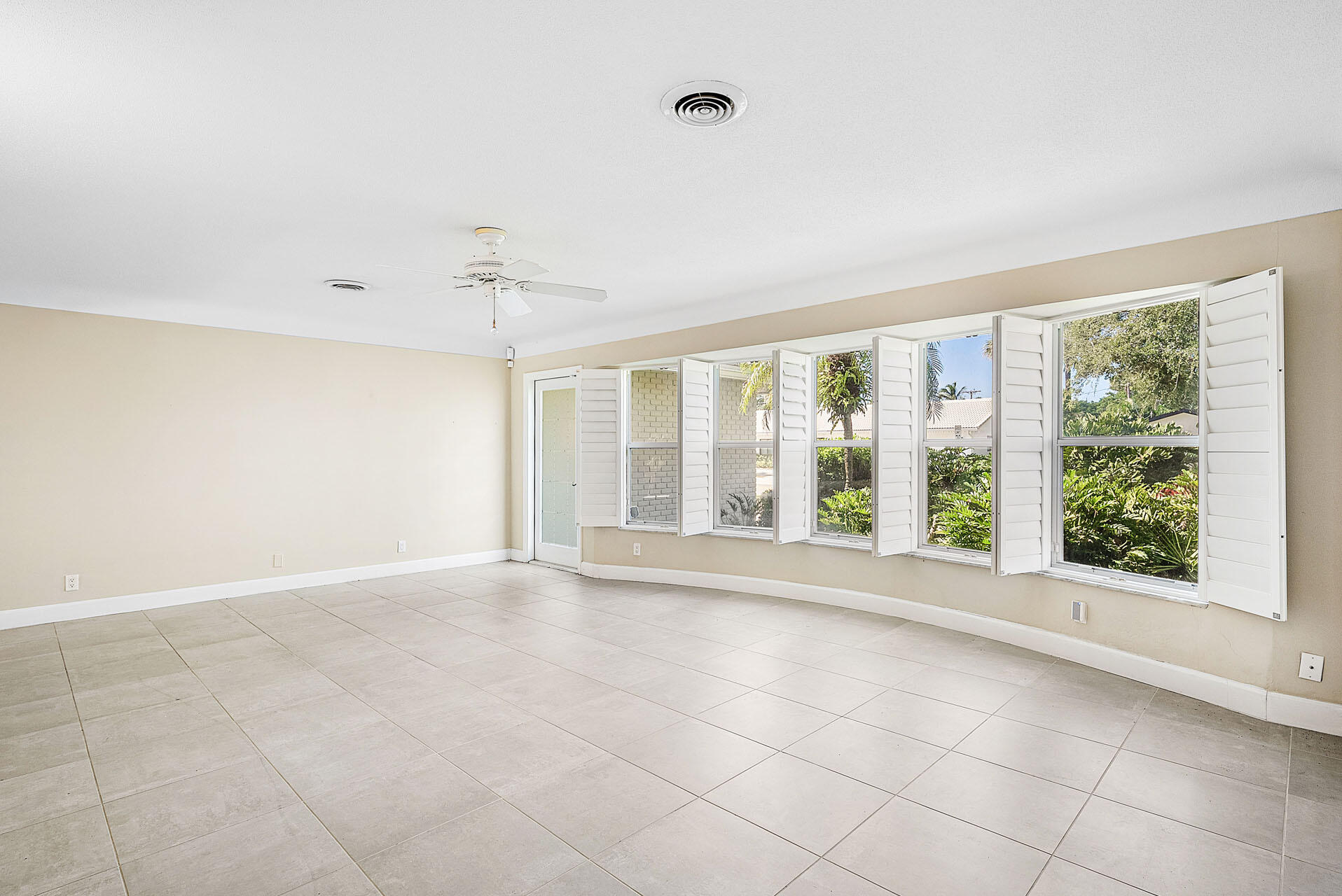 220 Southwest 9th Avenue Boca Raton, FL 33486 - Photo 9 of 42 a view of an empty room with a window