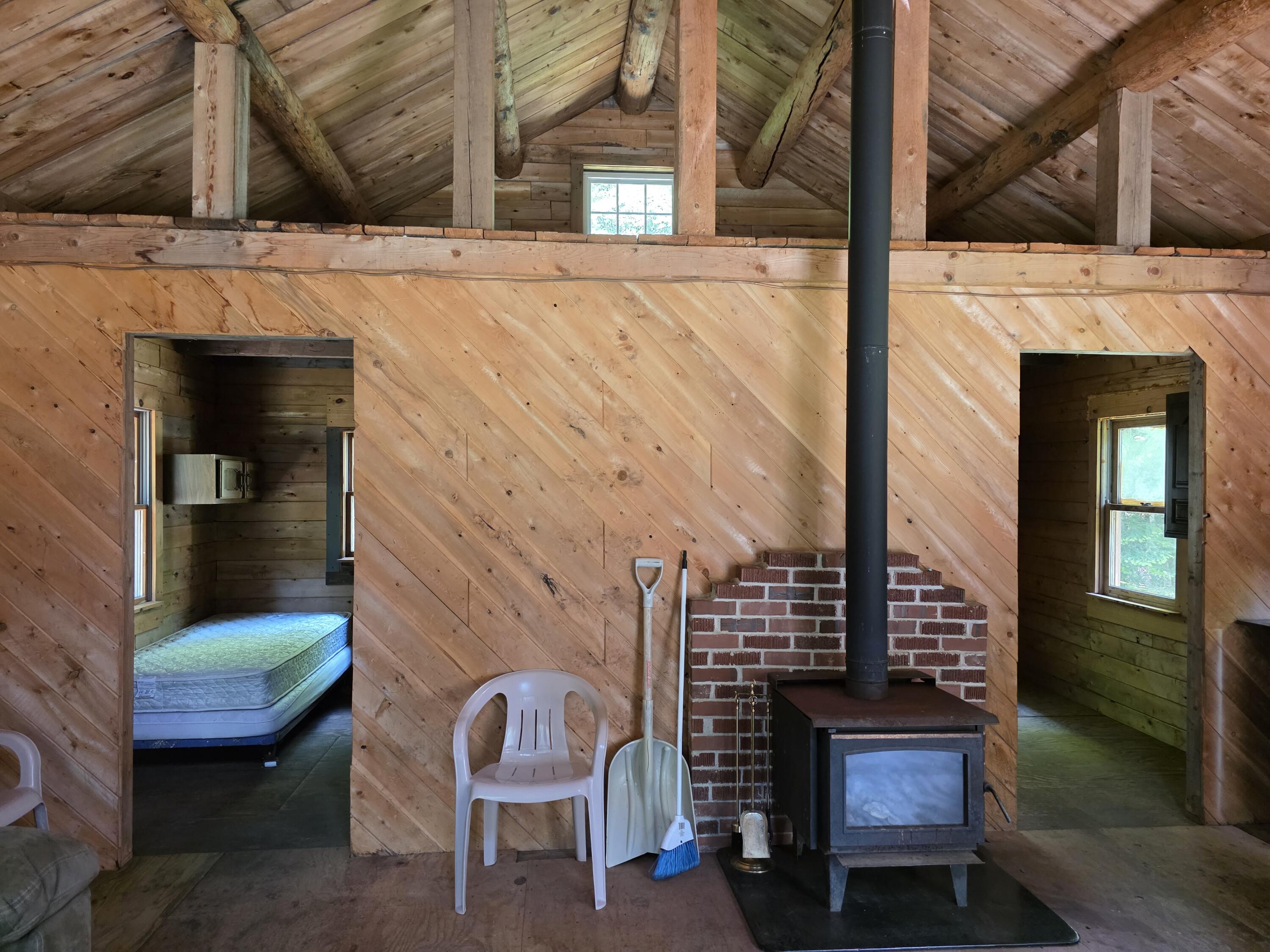 4-10b Camp Road Dyer Brook, ME 04747 - Photo 5 of 13 Living Area Wood Stove