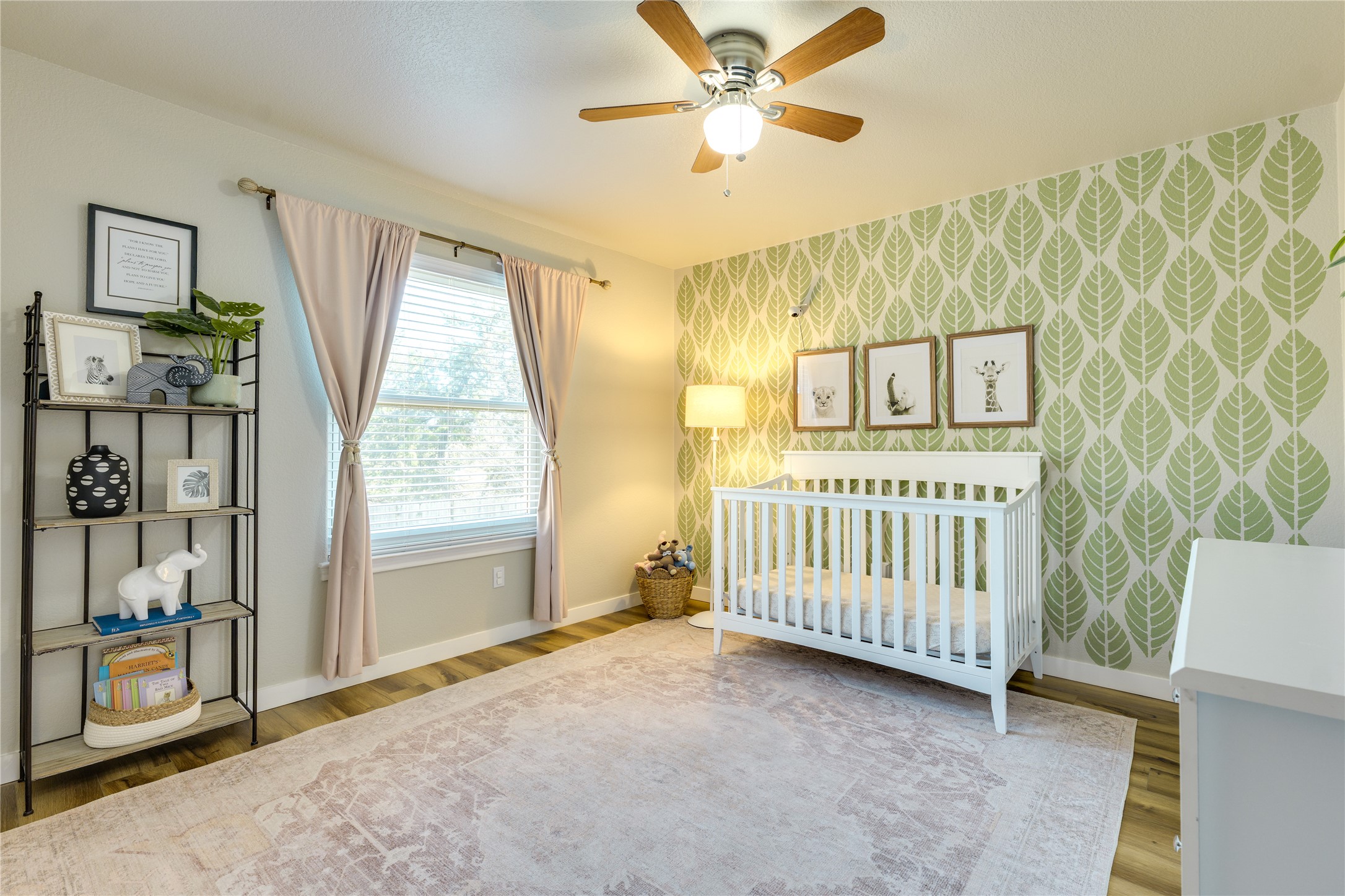 330 Southwind Road Point Venture, TX 78645 - Photo 22 of 39 The second bedroom on the lower level has a fun accent wall and is also very versatile.