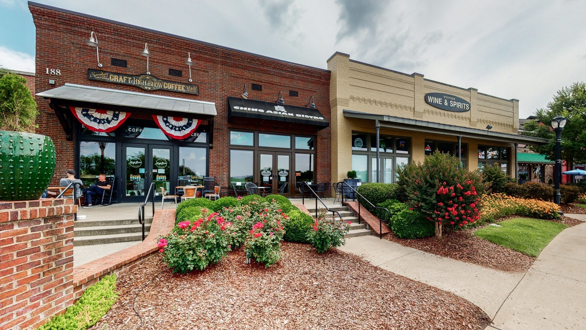 318 Byron Way Franklin, TN 37064 - Photo 52 of 53 a front view of a building with an entrance and flowers