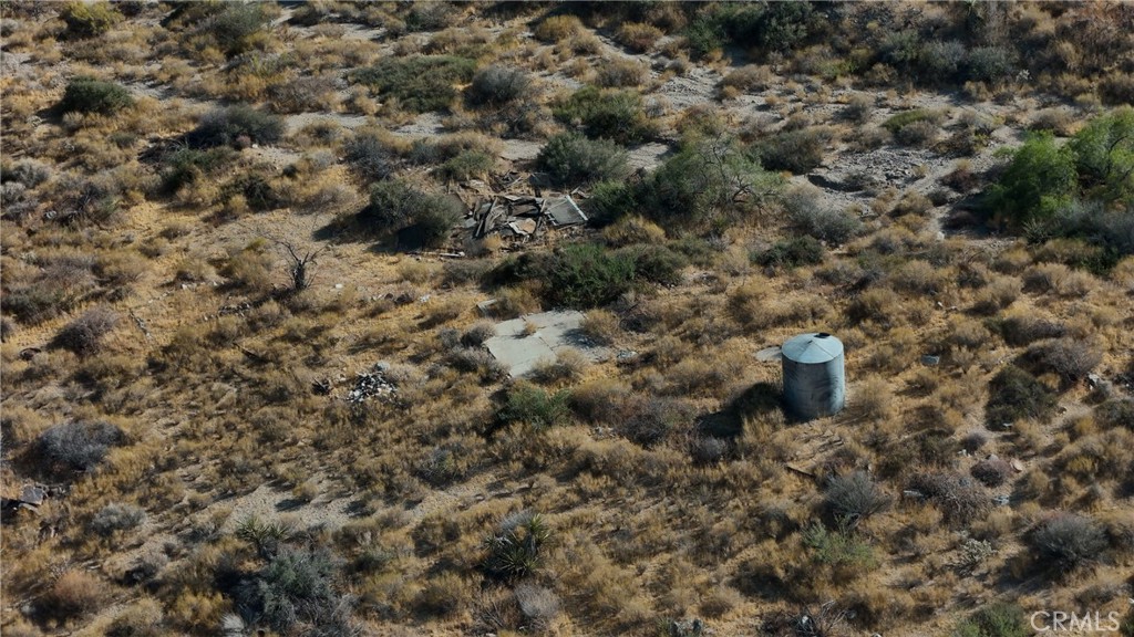 752 Big Morongo Canyon Road Morongo Valley, CA 92256 - Photo 7 of 11 Red boundary lines on pictures are an estimate and for marketing purposes only. Buyer to verify all aspects of this property including, but not limited to utilities, assessments, boundaries, usage, access, and zoning to satisfy themselves.