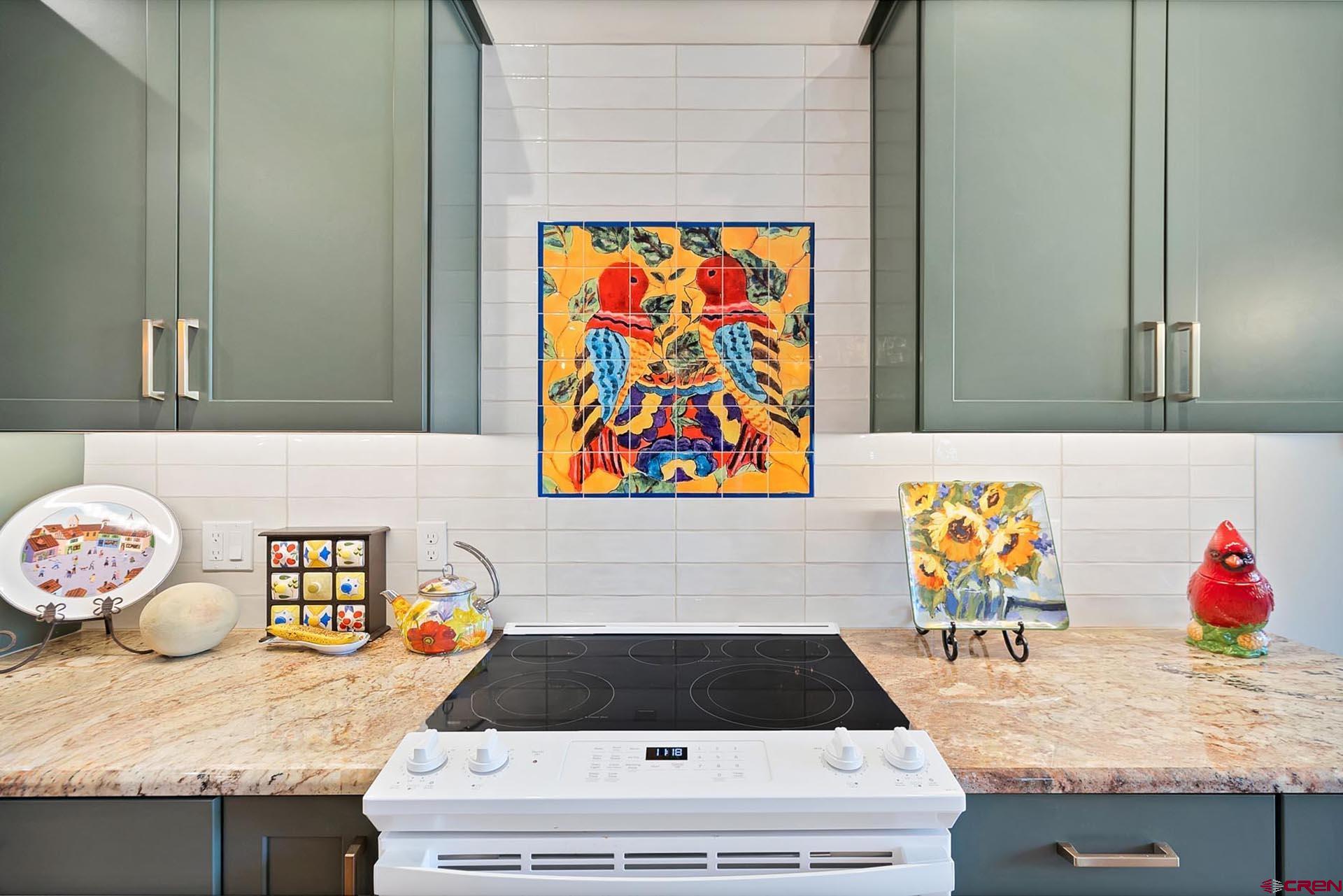 1470 Southeast Stonebridge Drive Cedaredge, CO 81413 - Photo 15 of 42 a bathroom with a sink a mirror and painting on the wall