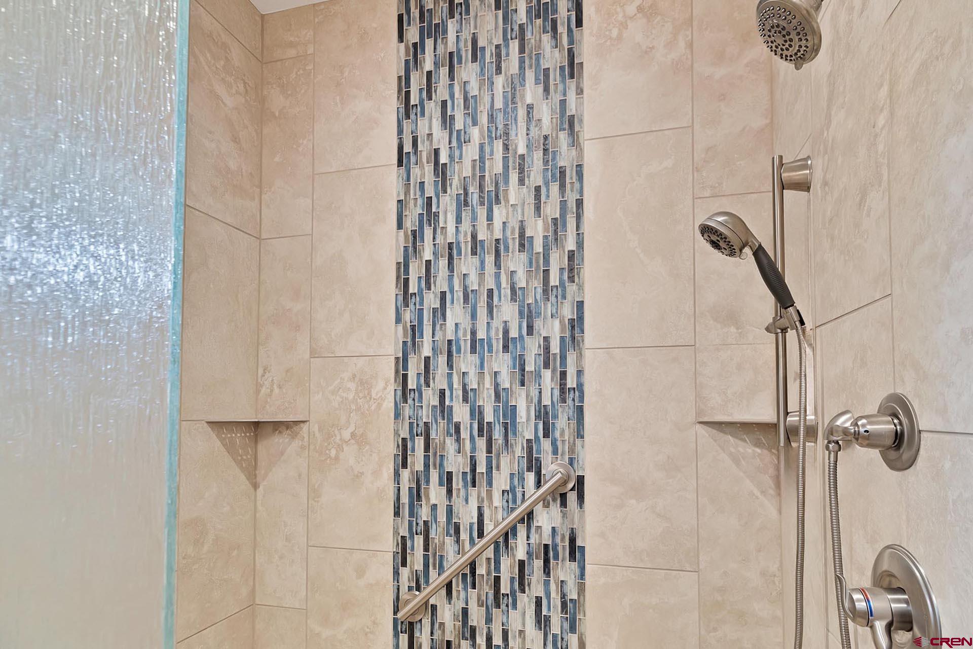 1470 Southeast Stonebridge Drive Cedaredge, CO 81413 - Photo 27 of 42 a bathroom with a shower