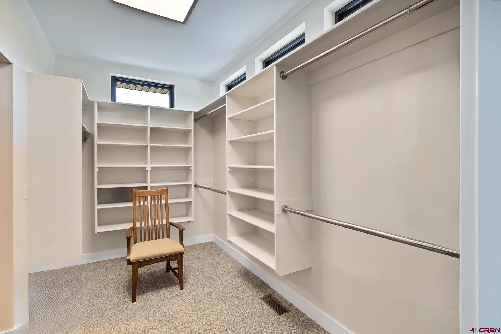 1470 Southeast Stonebridge Drive Cedaredge, CO 81413 - Photo 29 of 42 a view of a room with racks on the wall