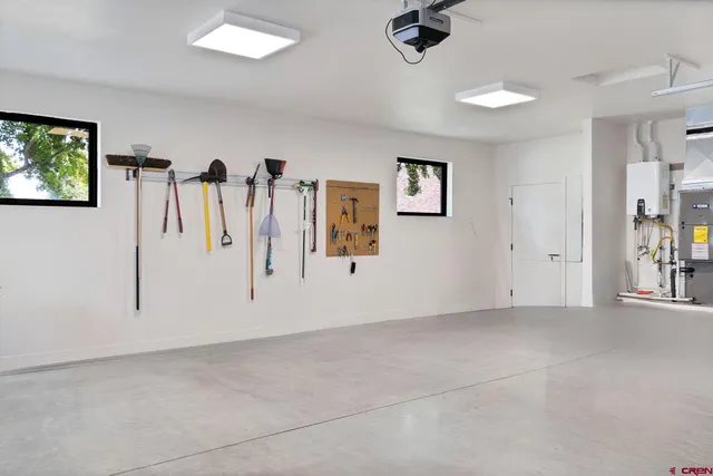 a view of a livingroom with a projector furniture