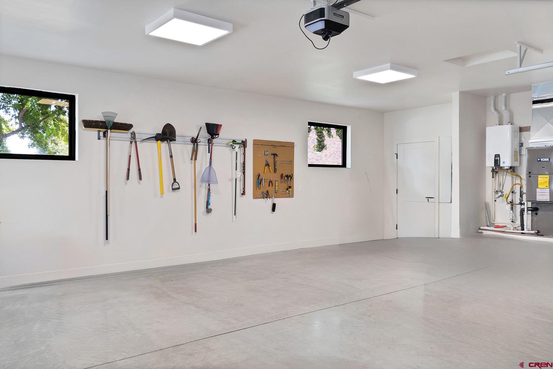 1470 Southeast Stonebridge Drive Cedaredge, CO 81413 - Photo 32 of 42 a view of a livingroom with a projector furniture