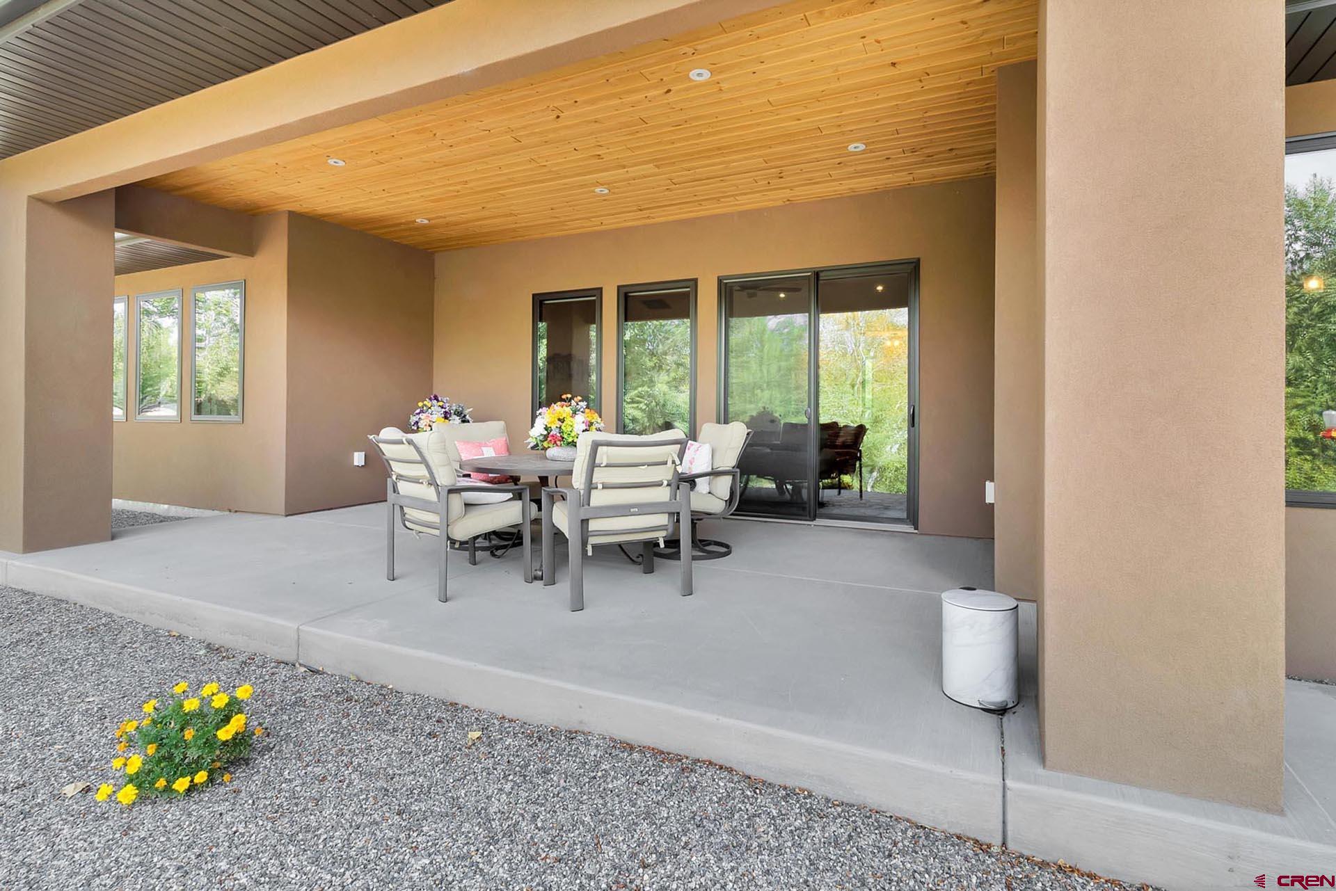 1470 Southeast Stonebridge Drive Cedaredge, CO 81413 - Photo 37 of 42 a living room with furniture and a window