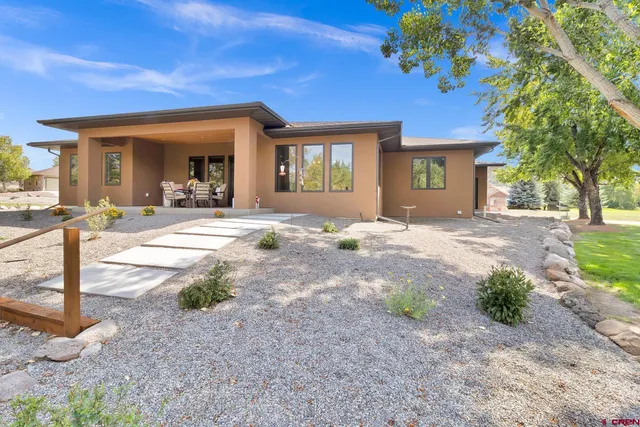 a front view of a house with a porch