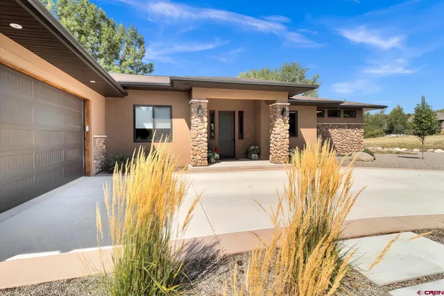 a view of a house with a patio