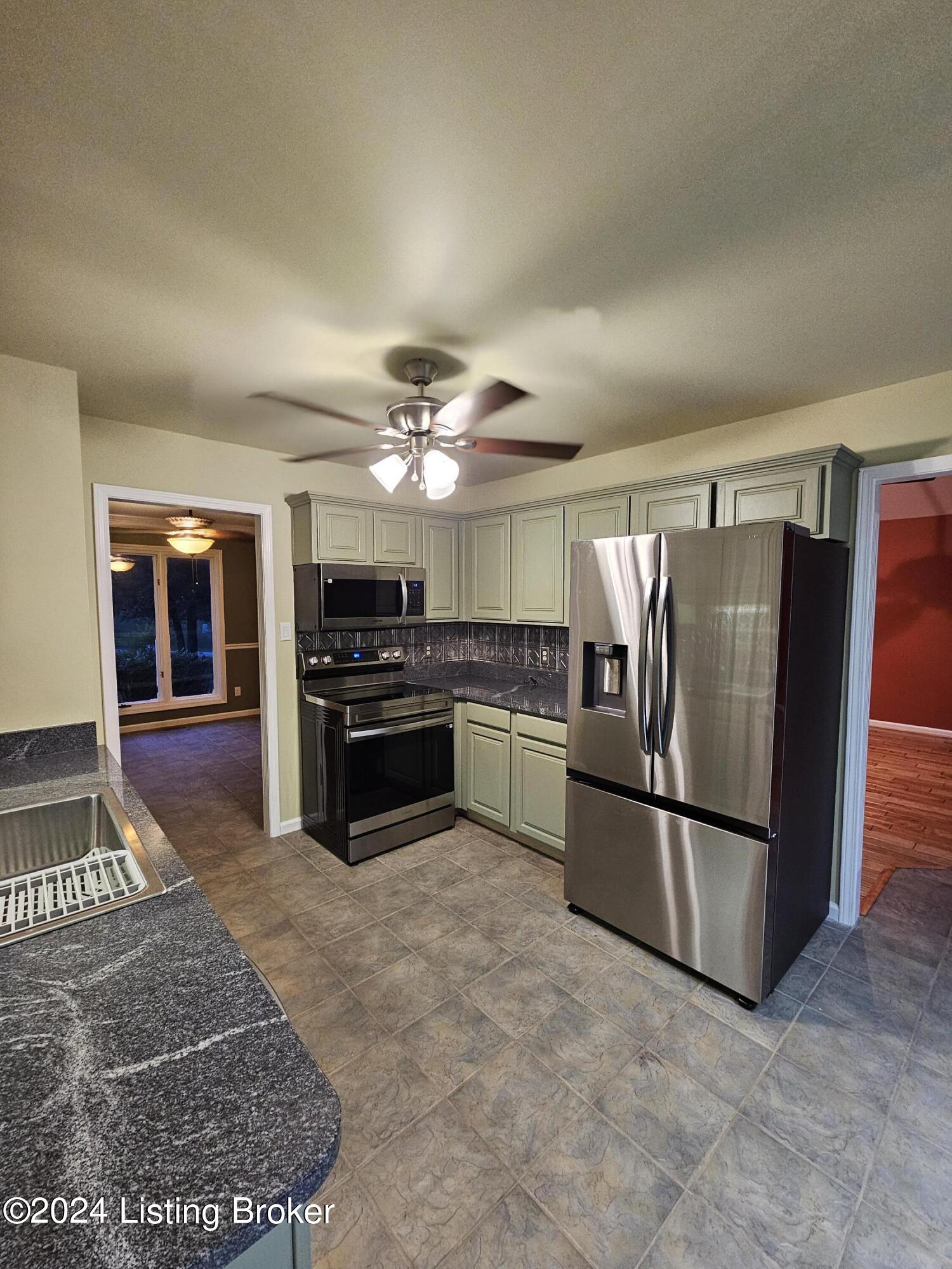 5006 Fox Run Road Buckner, KY 40010 - Photo 6 of 68 Updated Kitchen w/ Bay Breakfast Area! Pantry ! NEW Granite Counter Tops/New Appliance Package! Bay Breakfast Area