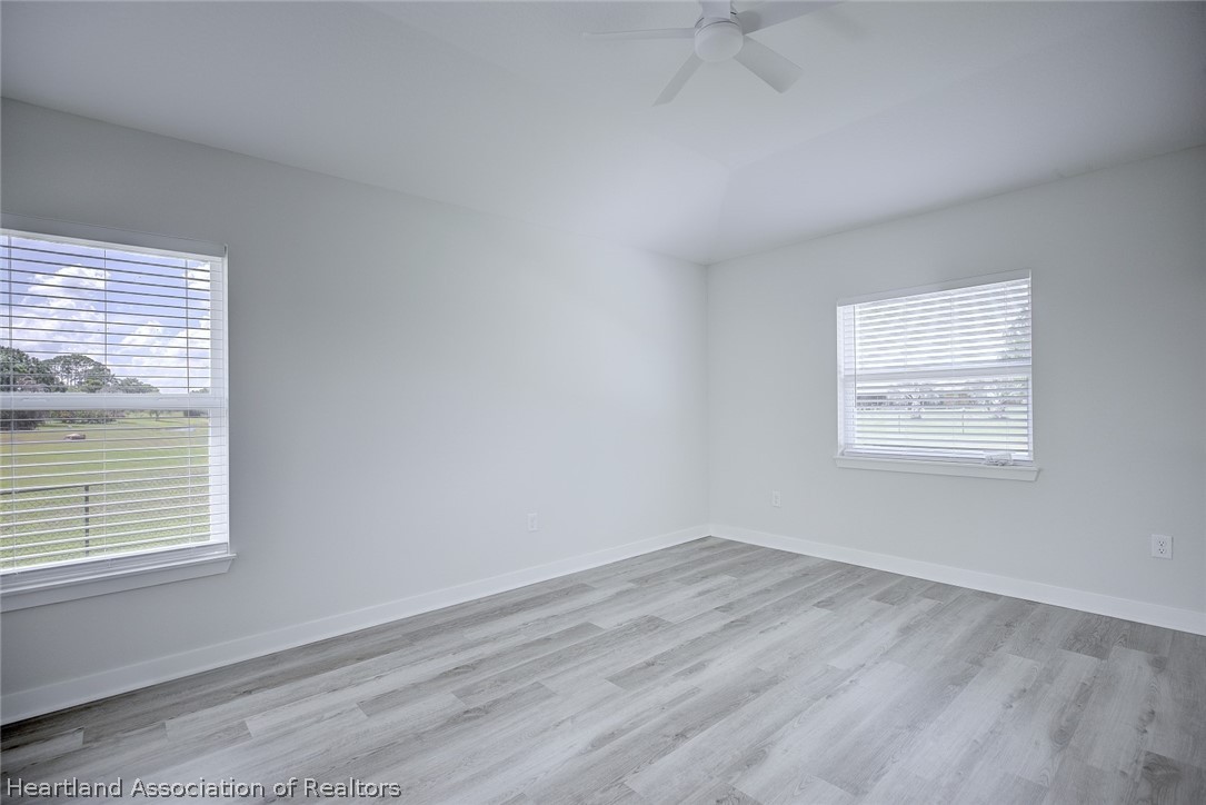 111 Vale Court Sebring, FL 33876 - Photo 20 of 40 an empty room with a window