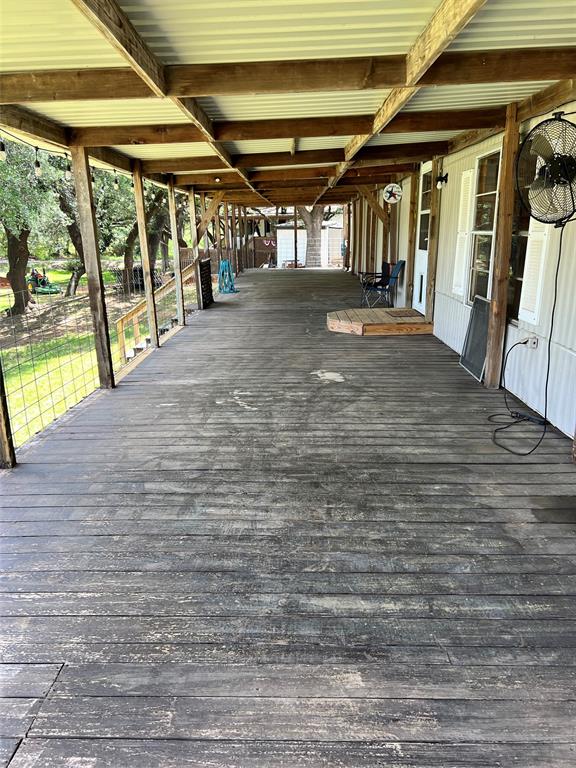 2334 San Bar Road, Unit 46 Graford, TX 76449 - Photo 25 of 37 a view of water heater room with wooden floor