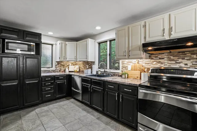 $445,000 | 81 Robinson Road, Unit A, Hudson, NH 03051