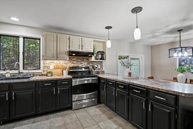 $445,000 | 81 Robinson Road, Unit A, Hudson, NH 03051