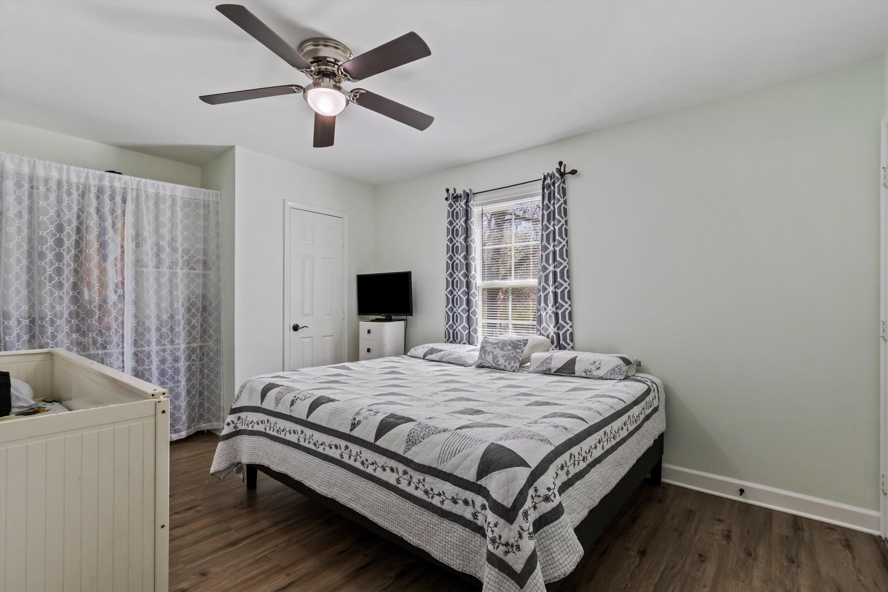 1217 Carlton Road Memphis, TN 38106 - Photo 13 of 32 Bedroom featuring dark wood-style flooring and ceiling fan