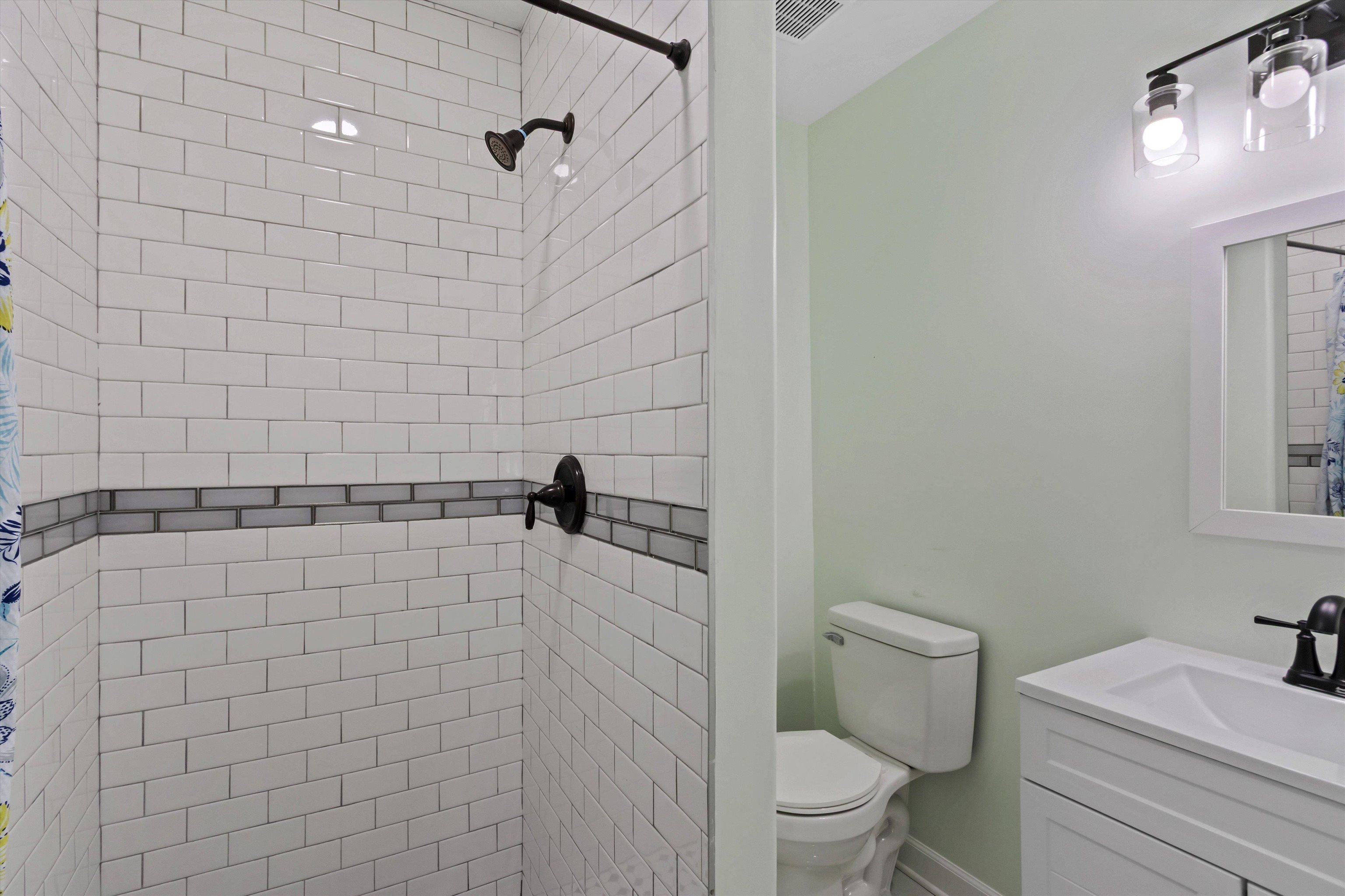 1217 Carlton Road Memphis, TN 38106 - Photo 15 of 32 Bathroom with vanity and a stall shower