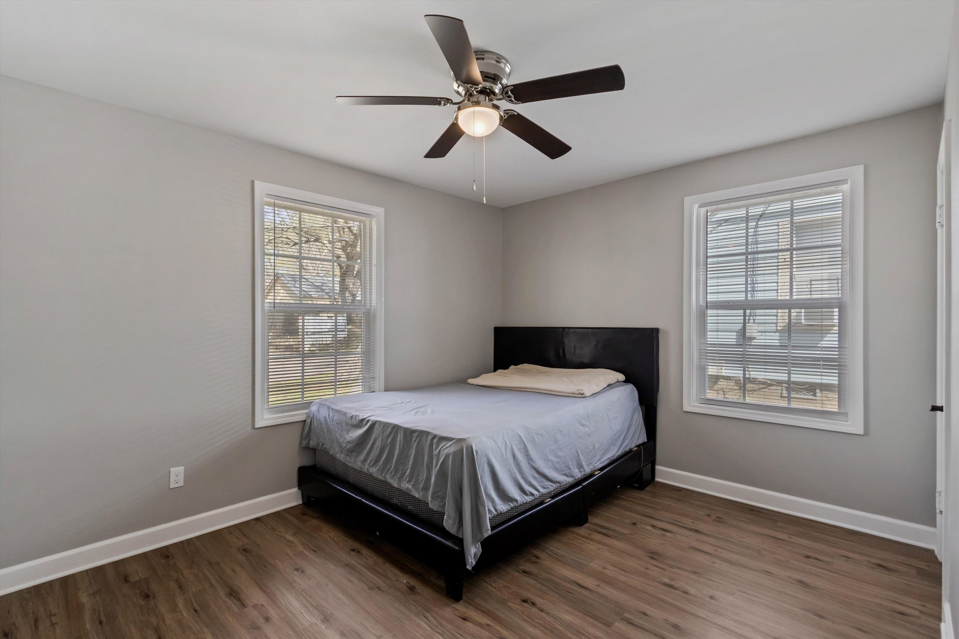 1217 Carlton Road Memphis, TN 38106 - Photo 17 of 32 Bedroom featuring dark wood finished floors and a ceiling fan