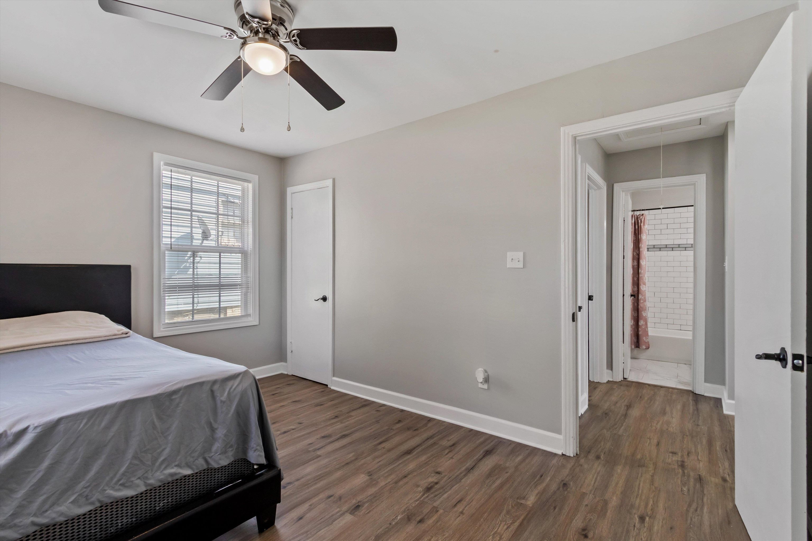 1217 Carlton Road Memphis, TN 38106 - Photo 18 of 32 Bedroom with dark wood-type flooring and a ceiling fan